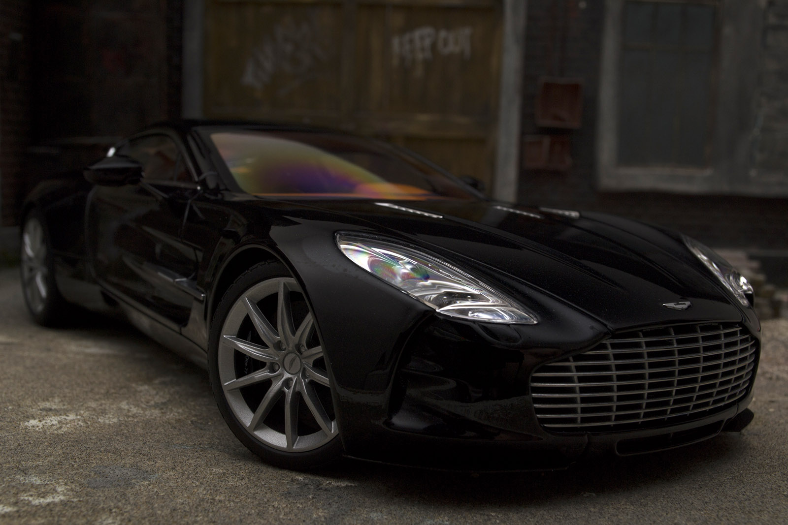 Aston Martin One-77 coupe 77 zwart pearl interieur oranje 1/18 Autoart
